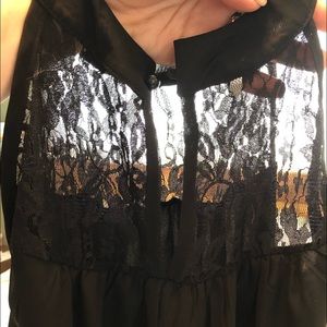 Mid-thigh black dress; lace and keyhole opening